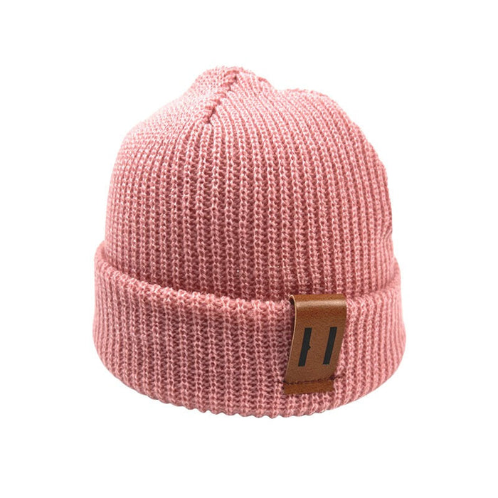 Solid Colored Warm Beanies With Leather Labels